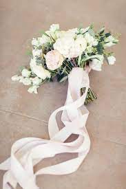 Just to make sure its secure, lets do it again, around, and up tight. Romantic Bouquet With Long Ribbon Wrap Wedding Bouquet Ribbon Wedding Bouquet Ribbon Wrap Bridal Bouquet