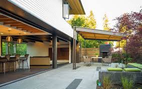 Colorful metal roof designs and stylish roof shingles, big windows and porches, front door hardware and gutters, outside lights, and yard landscape come together producing gorgeous modern house exterior design. Modern Front Porch Flat Roof Designs