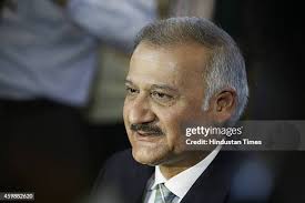 New CBI Director Anil Kumar Sinha prepares to sign a document as he... News  Photo