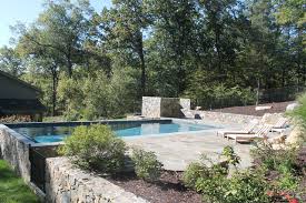 Maybe you would like to learn more about one of these? Natural Setting Swimming Pool Landhausstil Pools New York Von Rainbow Pools And Living Art Design Houzz