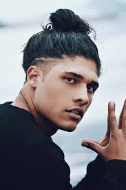 Young guys nowadays prefer the stylishly messy look. Undercut Man Bun Undercut Manbun Longhairmen Want To Find A Suitable Undercut Men Hairstyle Shor Mens Long Hair Undercut Undercut Men Man Bun Hairstyles
