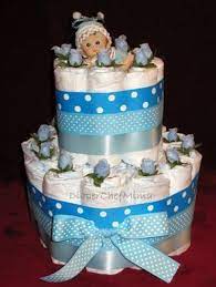 Baby Shower Centerpiece Ideas Diaper Chef Mima Baby Shower Diaper Cake Centerpieces Panales De Baby Shower Fiesta Baby Shower Diy Baby Shower Decorations