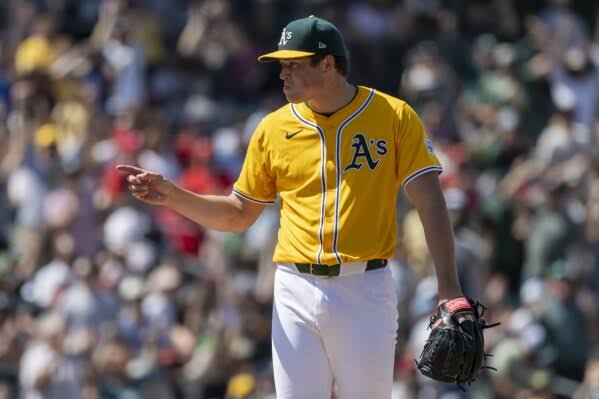 A's catcher MacIver gets go-ahead hit, throws out runner to end game in big  league debut at age 28 | AP News