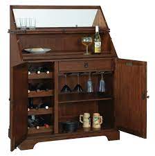 It is made of solid hardwoods and veneers. Howard Miller Good Cheer Wine Bar Console 695203 Home Bars Usa
