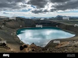 Turquoise waters of Viti Lake in the Viti Crater of Krafla. Krafla is a  volcanic caldera of about 10 km in diameter with a 90 km long fissure zone  Stock Photo - Alamy