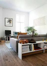 14 Sneaky Ways To Add More Storage To Small Spaces Small Apartment Living Room Small Apartment Decorating Small Living Rooms