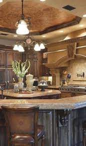 How do you decorate a kitchen? Find More Ideas Rustic Tuscany Kitchen Decor French Country Kitchen Cabinets Rustic Tuscan Kitchen Interi Tuscan Kitchen Design Tuscany Kitchen Tuscan Kitchen