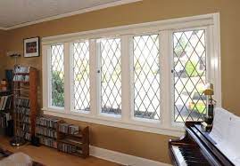 Interior Storm Windows Save Homeowners Money In Two Ways Window Grill Design Modern Interior Storm Windows Window Inserts