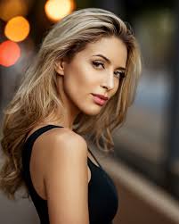 camera Canon EOS R with 105mm lens under natural sunshine light