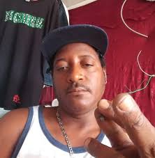 BUSTED WITH A .45 HANDGUN Police officers