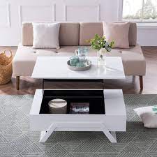 #14 cornelia lift top coffee table minimalist homeowners will definitely love one of these lift top coffee table designs, it has lots of room beneath the top panel to reduce the clutter from your living room and your life. 7 Best Lift Top Coffee Tables That Convert To Desks Kitchn