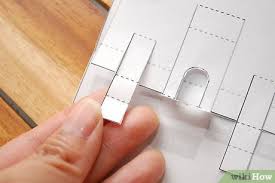 Instead of paint, this one is decorated with duct tape for a less messy and more durable finish. How To Make A Castle Pop Up Card Robert Sabuda Method