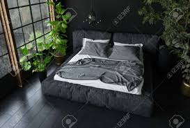 Custom made cory super king size bed, putty cotton with black stained oak legs. King Size Bed In Dark Colours In Bedroom With Black Interior Stock Photo Picture And Royalty Free Image Image 81190979