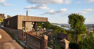 This Modern House Offers A Haven Of Peace And Elegance In Rouen France Architect Audrey Michelier Atel Mur Brique Bardage Bois Exterieur Maison Architecte