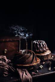 Spiced Rum Date Walnut Molasses Bundt Cake With Rum Caramel Drizzle Stems Forks Dark Food Photography Moody Food Photography Spiced Rum