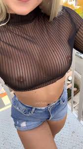 Petite Elli's busty tits in a revealing OnlyFans photo gallery