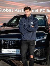 + zayed (l) present the trophy to barcelona's players after winning the 2009 fifa club world cup at zayed sports city stadium in abu dhabi on december 19, 2009. Barca Stars Receive Their Audi Cars