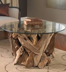 Driftwood turned into a coffee table through the addition of a glass top makes for a very interesting living room furniture. Teak Driftwood Glass Coffee Table Vivaterra