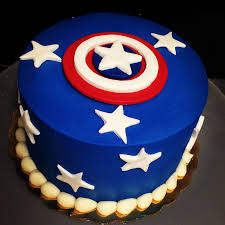 We breakdown the 'captain america: Blue Buttercream Iced Cake With White Fondant Stars And Fondant Captain America Topper By Suga Captain America Birthday Cake Captain America Cake America Cake