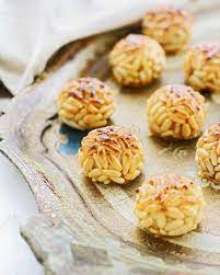 Panellets Are Small Pastries Made Of Pine Nuts Almonds And Sugar With Different Shapes And Flavors Eaten During La Castanyada Catalan Recipes Spain Food Food