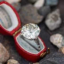 Platinum with a tanzanite and diamonds. Magnificent 8 Carat Old European Cut Diamond Engagement Ring