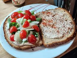 Homemade hummus sandwich with Dave's seed bread