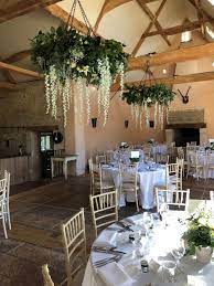 Floral Chandeliers From Enchanted Floristry Oxleaze Barn Barn Wedding Venue Event Venue C Barn Wedding Flowers Wedding Flowers Summer Floral Chandelier