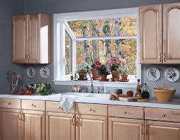 How To Use A Kitchen Garden Greenhouse Window Kitchen Garden Window Kitchen Design Kitchen Remodel