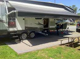 An rv patio rug helps keep sand outside where it belongs. Rv Mats Read This Before Buying An Rv Patio Mat Rvshare Com