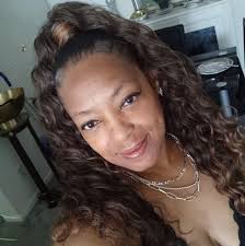 Eleventh grader Mariah Compton proudly stands by her ink pen drawing of  Sojourner Truth that she created for this year's "Art of Soul" exhibit at  the Art Center of Battle Creek that