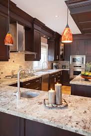 Giallo Ornamental Granite For Warm Elegant Kitchen Design With Images Popular Kitchen Colors Outdoor Kitchen Countertops Granite Countertops Kitchen