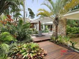 Best 25 of tropical backyard landscaping articles. Like This Tropical Entrance To A Home Tropical Backyard Tropical Garden Design Tropical Landscaping