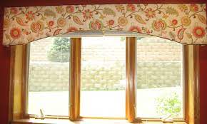 Valances are a popular decorative choice in concealing drapery hardware. Window Fashions Happy Fabric On A Shaped Cornice Board Cornice Board Cornice Design Window Cornices