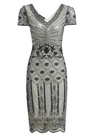As the general state of things starts to look a bit sunnier, odds are that you might find yourself back on the guest list of that previously postponed wedding. Heather Beaded Flapper 1920s Gatsby Inspired Art Deco Midi Wedding Guest Dress Roari Evening Dresses With Sleeves Embellished Dress Midi Wedding Guest Dress