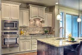 I chose sherwin williams snowbound paint color. Sherwin Williams Snowbound Painted Cabinets Make The Kitchen Feel Bigger And Elegant White Kitchen Paint Neutral Wall Colors Distressed Kitchen