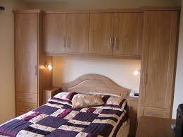 Make the most of your small bedroom by making smart choices in furniture that provides the storage that many undersized rooms lack. Built In Wardrobe Around Bed Google Search Built In Wardrobe Around Bed Wardrobe Around Bed Bedroom Built Ins