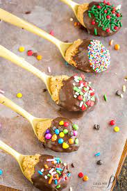 The reason buckeye balls are only partially dipped, is so that they resemble the nut of a buckeye tree, the state tree of ohio. Buckeye Chocolate Peanut Butter Truffle Spoons Call Me Pmc