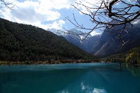 Consisting of 13 peaks, among which shanzidou is the highest with an altitude of 5,600 meters (18,360 feet), the mountain stretches a length of 35 kilometers (22 miles) and a width of 20 kilometers (13 miles). Jade Dragon Snow Mountain Lijiang Yulong Snow Mountain Yunnan