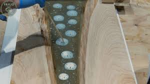 How To Make A Beach Inspired River Table With Sand Dollars That Glows In The Dark Sand Dollar Beach Inspired Glow Table