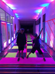 Mother Son Glow In The Dark Party Dollar Store Neon Poster Board And Duct Tape For Checkerboard Path Glow In Dark Party School Dance Ideas Neon Party