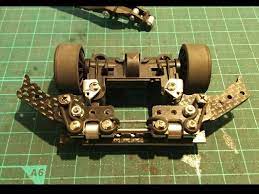 新型のc atバンパー作った シャフトストッパーの削った径は おじゃぷろさんのを参考に近い感じに削り ベースのカーボンプレートはバットマンカーボンへ新たに位置決めて穴開けし 可動部のストッパーとリフターのゴムリングとり回しを3 カーボンの端材とペラシャで作り