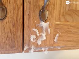 to clean grimy kitchen cabinets with