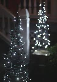 Tomato cage christmas tree lights trees are costly and the actual types are high maintenance, particularly if you're planning on traveling. Diy Tomato Cage Christmas Tree Lights 17 Apart