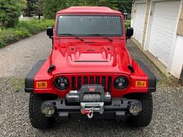 Image result for Flame Red 2006 Jeep