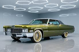 Image result for Medium Gold 1969 Cadillac