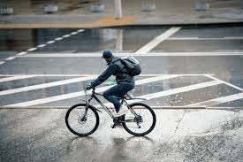 Image result for rain cyclist