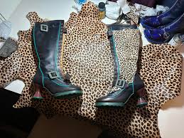 Wearing my Fluenicorns today. It was difficult to get a good photo today.  The tights are purple/black stripes from SNAG. Thanks to Janice Mapes  Stafford for her fashion photography skills