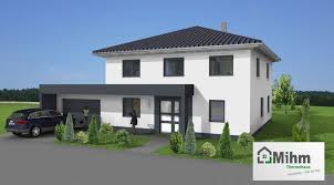 Stadtvilla Mit Garage In 35576 Wetzlar Massivhausbau Made In Thuringen Stadtvilla Mit Garage Stadtvilla Fassade Haus