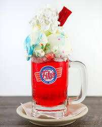 Sometimes you need a little Razzle Dazzle 💫🎂 Draft Strawberry Pop topped  with birthday cake ice cream, whipped cream and a strawberry Twizzler Try  this mighty creation at Fitz's Delmar and Fitz's