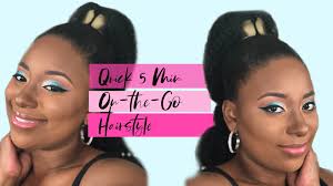 To diy this look, tie your hair into a ponytail, then section off the ends of your hair with equally spaced elastics every few inches. 5 Minute Back To School Style Genie Ponytail On Natural Hair Vicariously Me Natural Hairstyles Fashion Beauty Lifestyle Blog